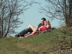 A sexy blonde lady enjoy pleasing her mans cock outdoors