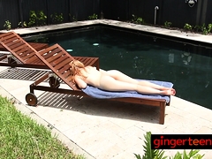 Hot redhead hottie sunbathes in the nude
